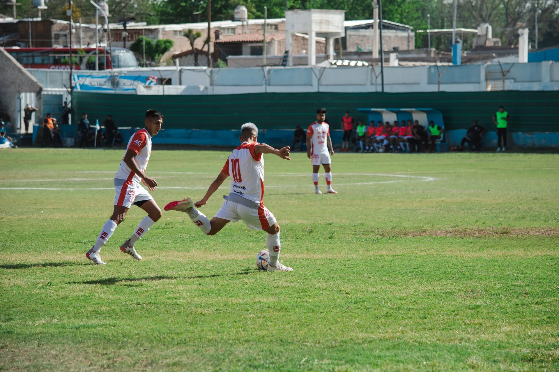 Amateur soccer players competing in a match, illustrating a LeagueLobster alternative for running a league
